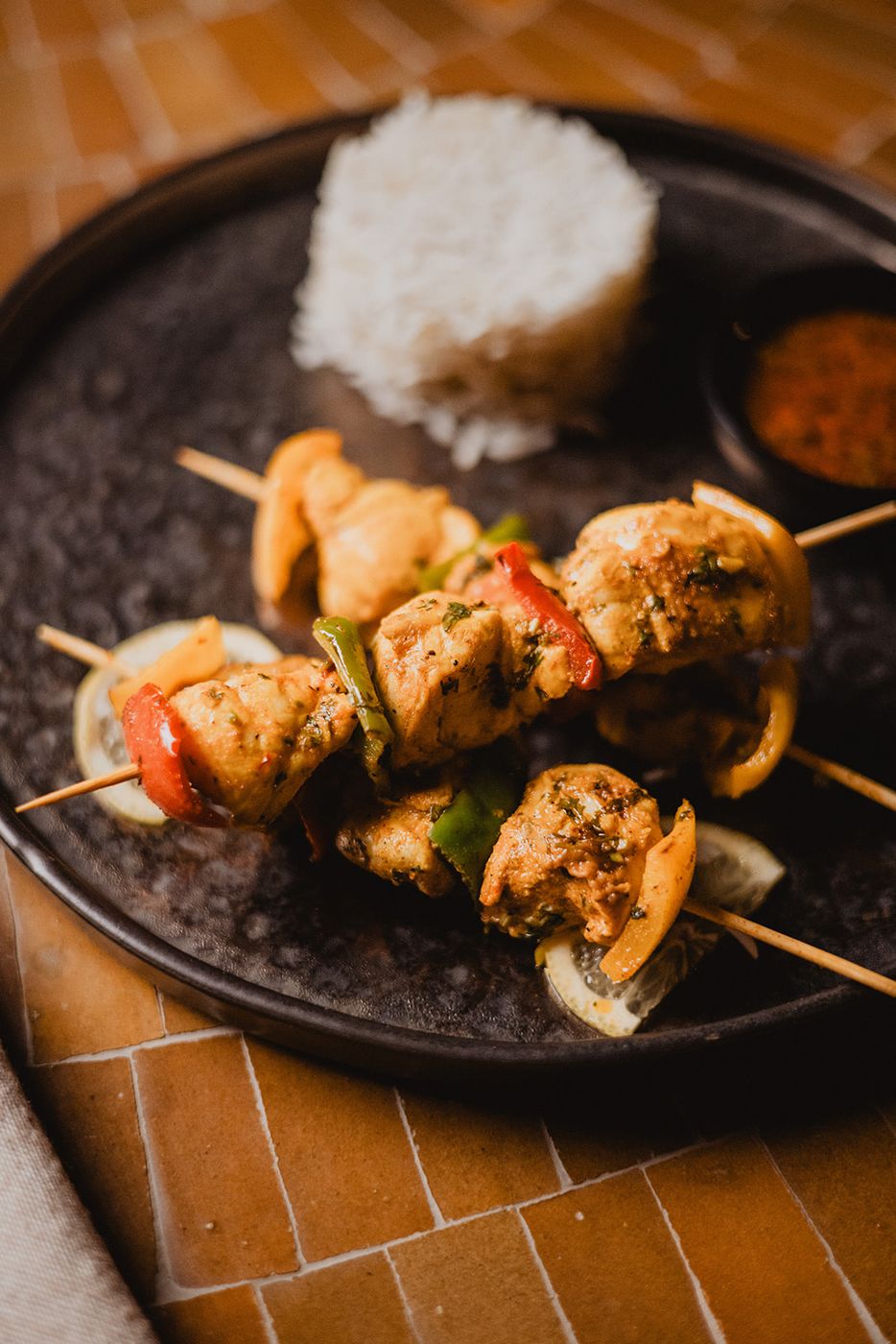 Grilled chicken skewers with rice