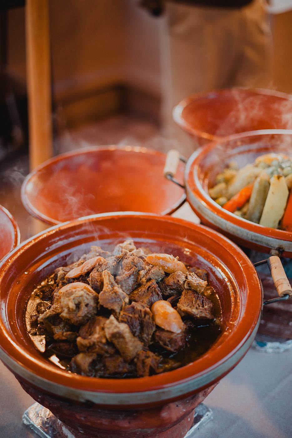 Steaming tagines on the buffet